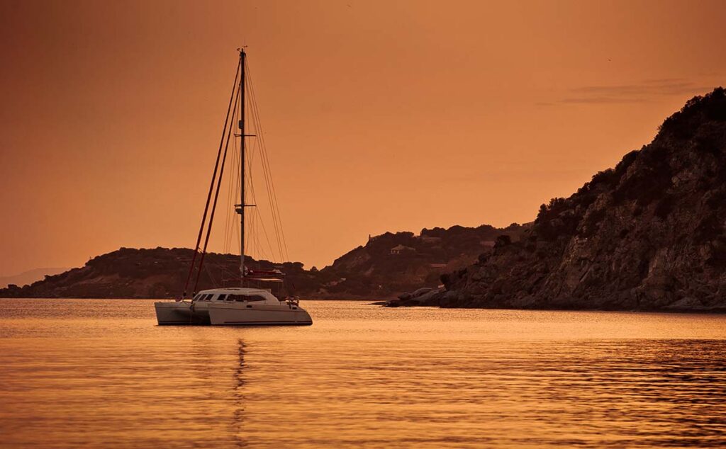 catamaran in greece in sunset